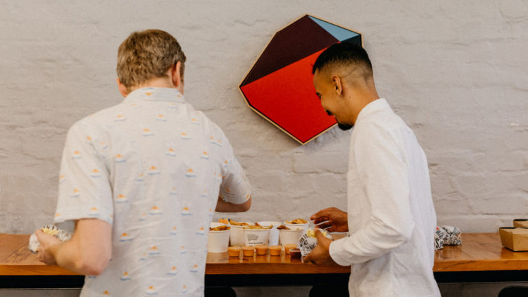 Two men getting lunch at work